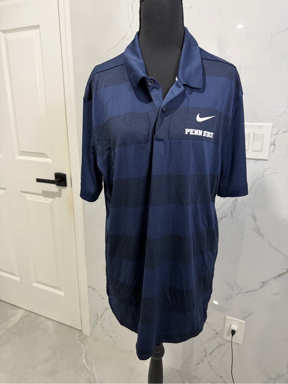 Nike Men’s Navy and Dark Navy Striped Polo